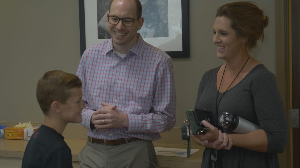 Dr. Langford talking with a family
